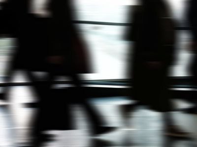 Abstract motion blur of a yoga practitioner moving.